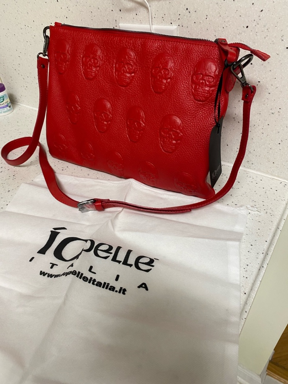 NWT. IOpelle, red leather, skull, crossbody/clutch, handbag.